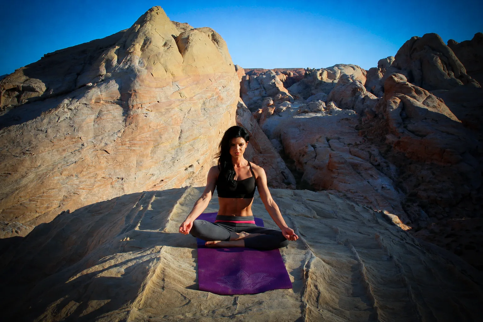 Andra Purba, founder of Integrity Wellness, practising yoga at Valley of Fire